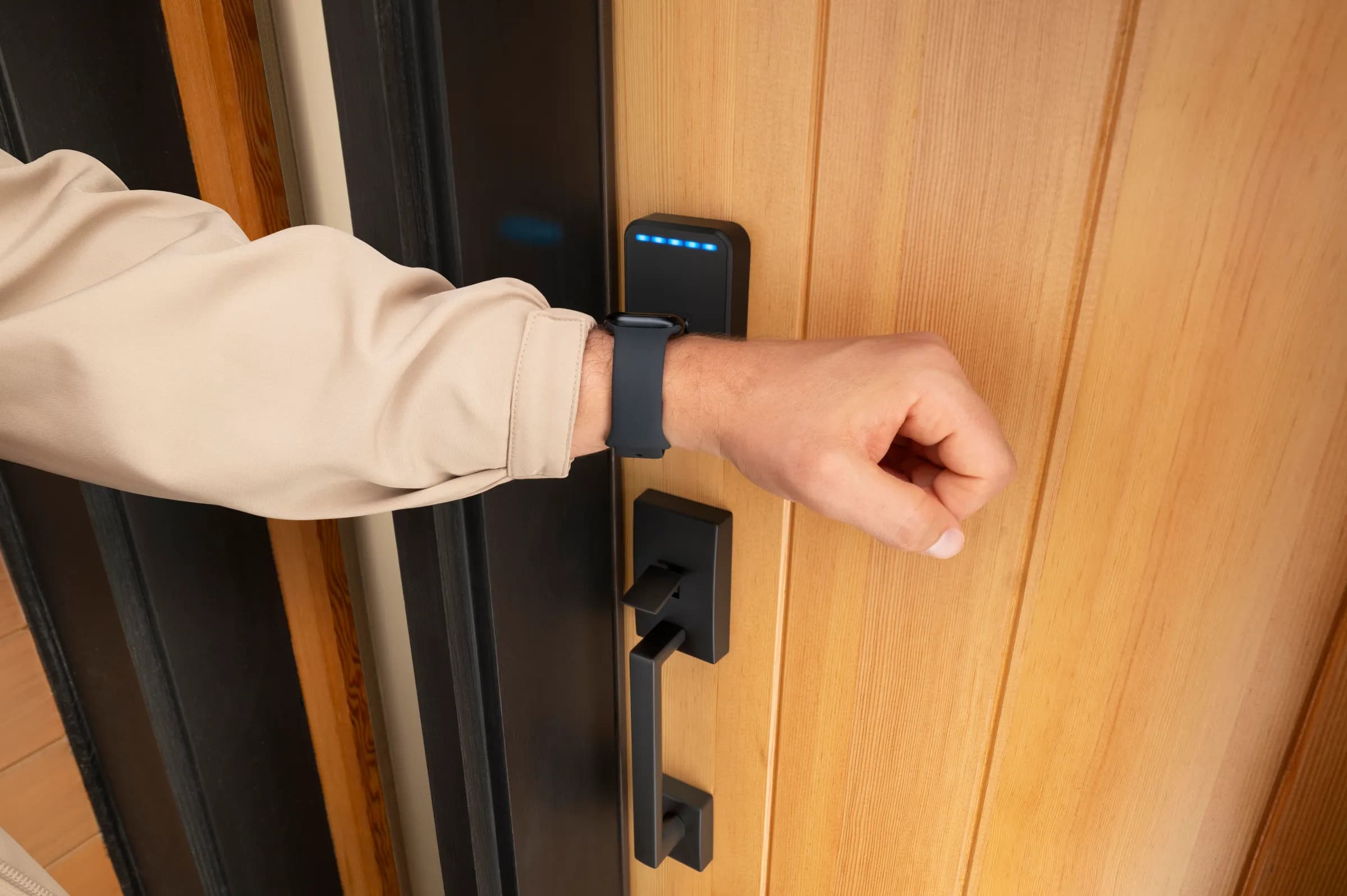 The Schlage Sense Pro smart lock, being opened using NFC.