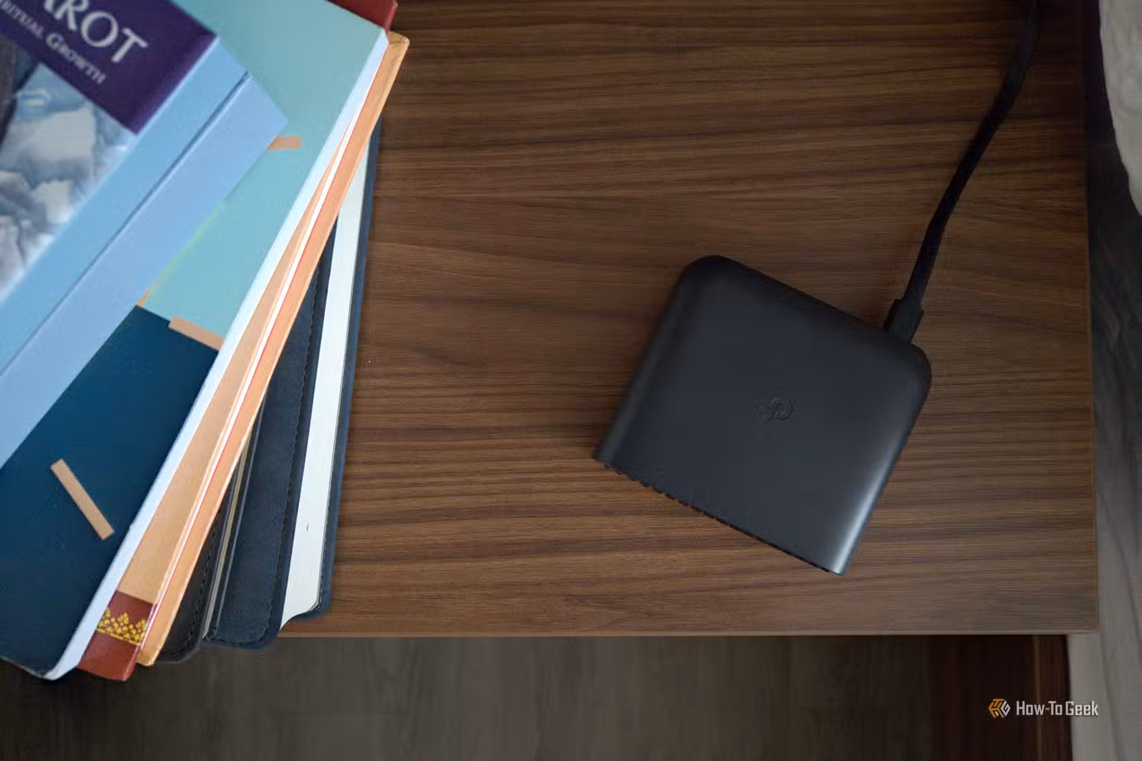 Top-down view of a TP-Link travel router.
