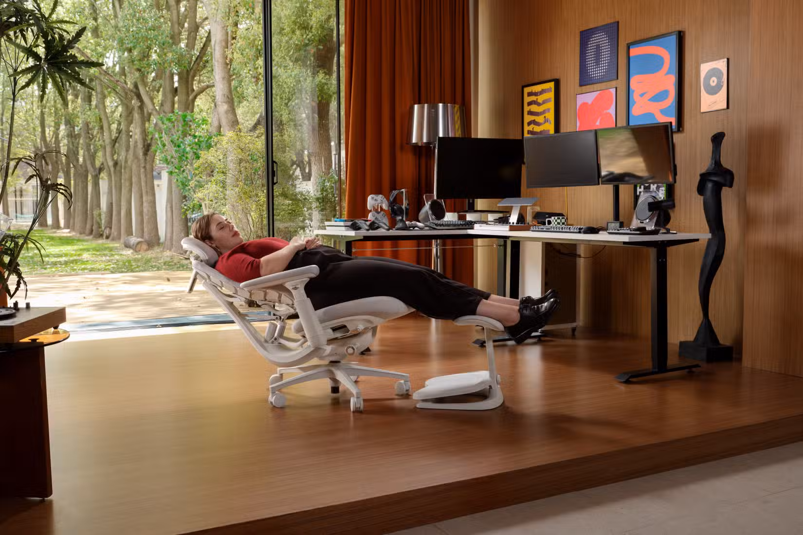 Woman reclined in the LiberNovo Maxis chair