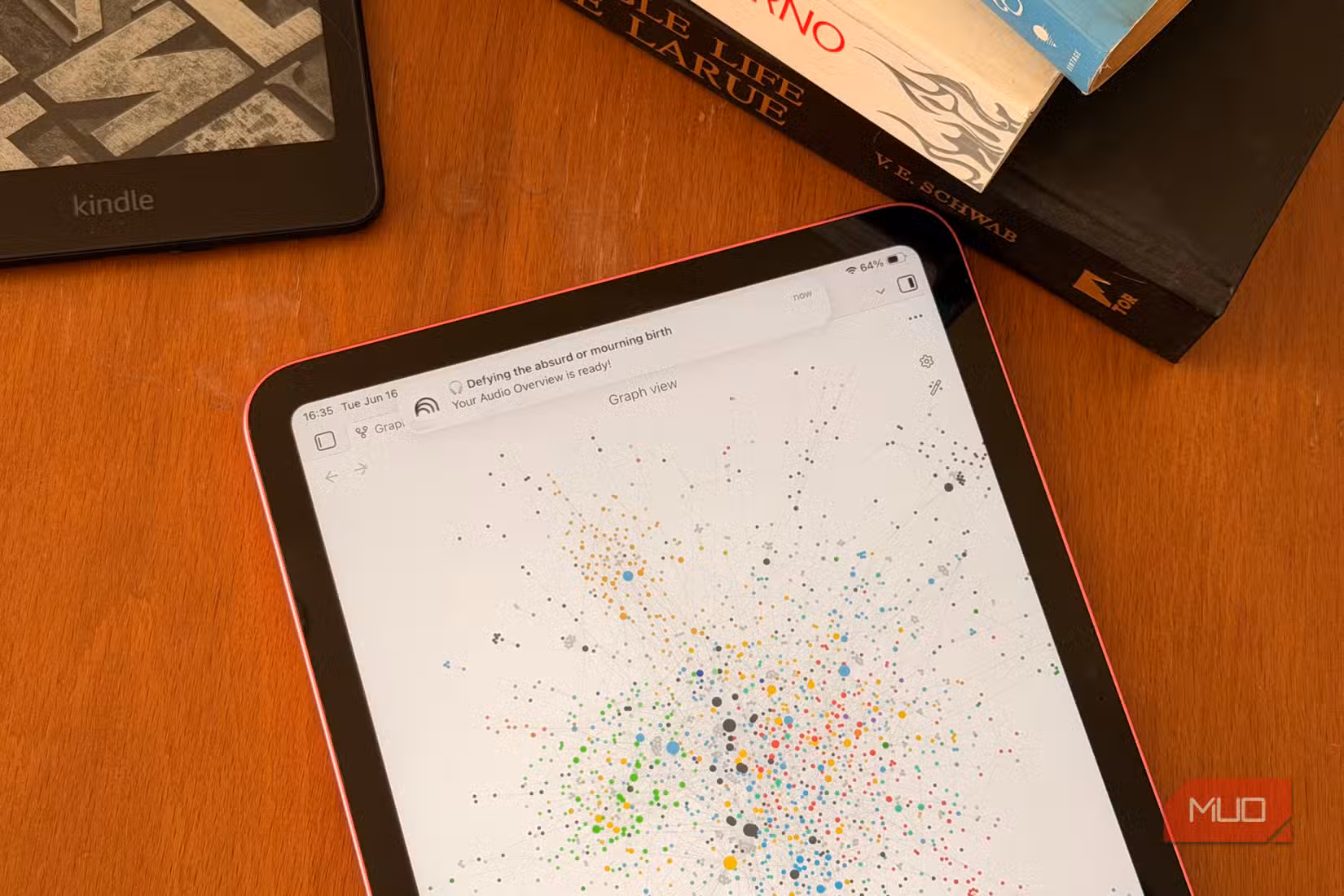 An iPad on a desk showing an Obsidian vault's graph view