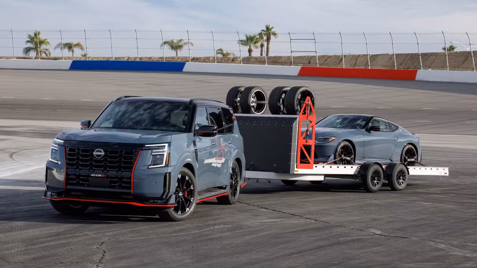 2026 Nissan Armada Nismo towing Nissan Z Nismo.