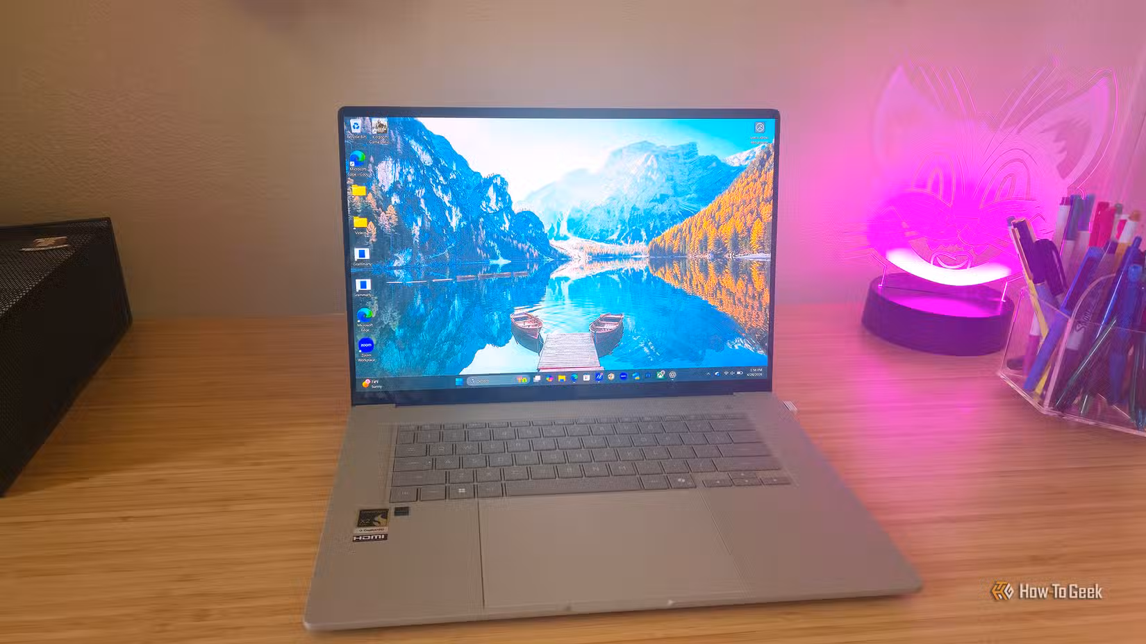 The ASUS Zenbook A16 (2026) laptop sitting open on a desk.
