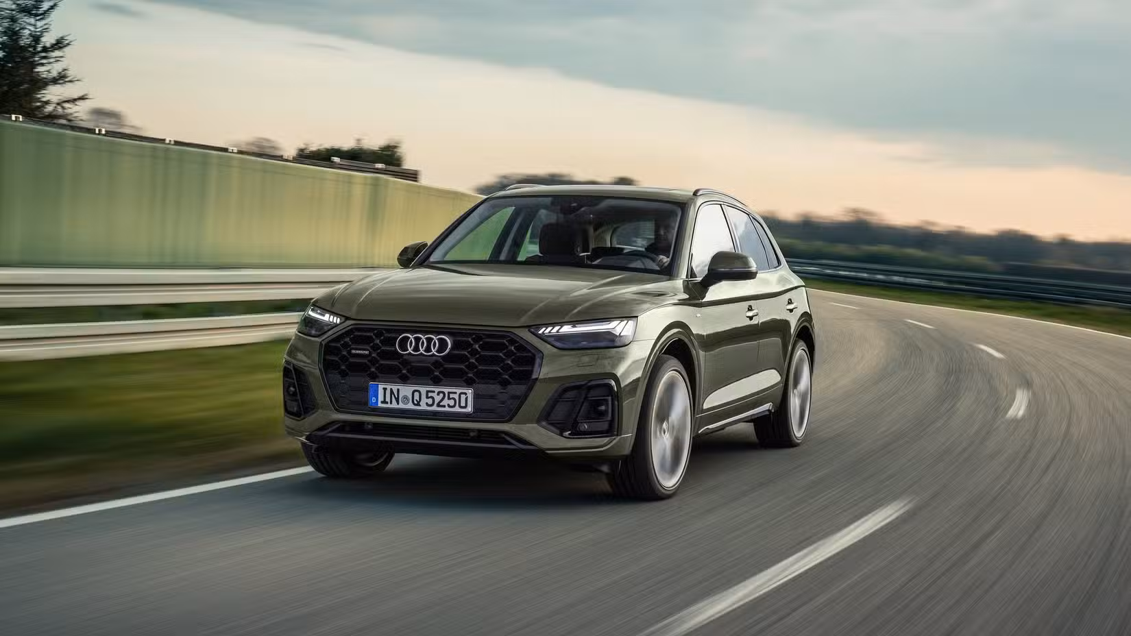 Front 3/4 action shot of a 2021 Audi Q5