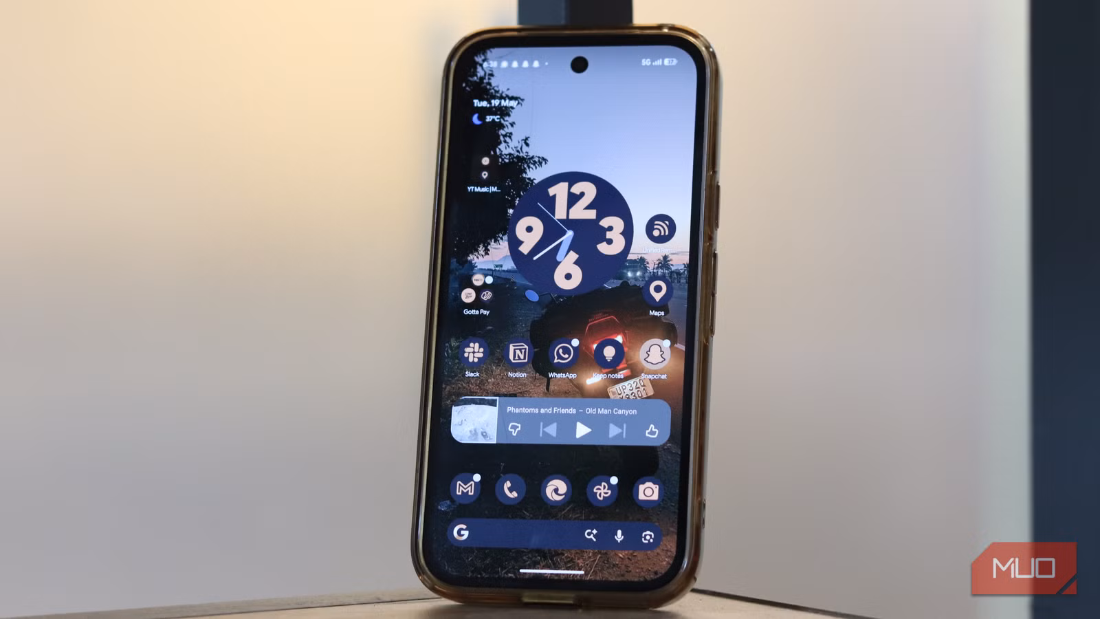 Pixel 9a kept on shelf with homescreen.