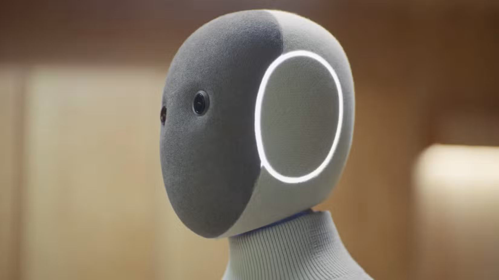 1X NEO humanoid robot still from promotional video.