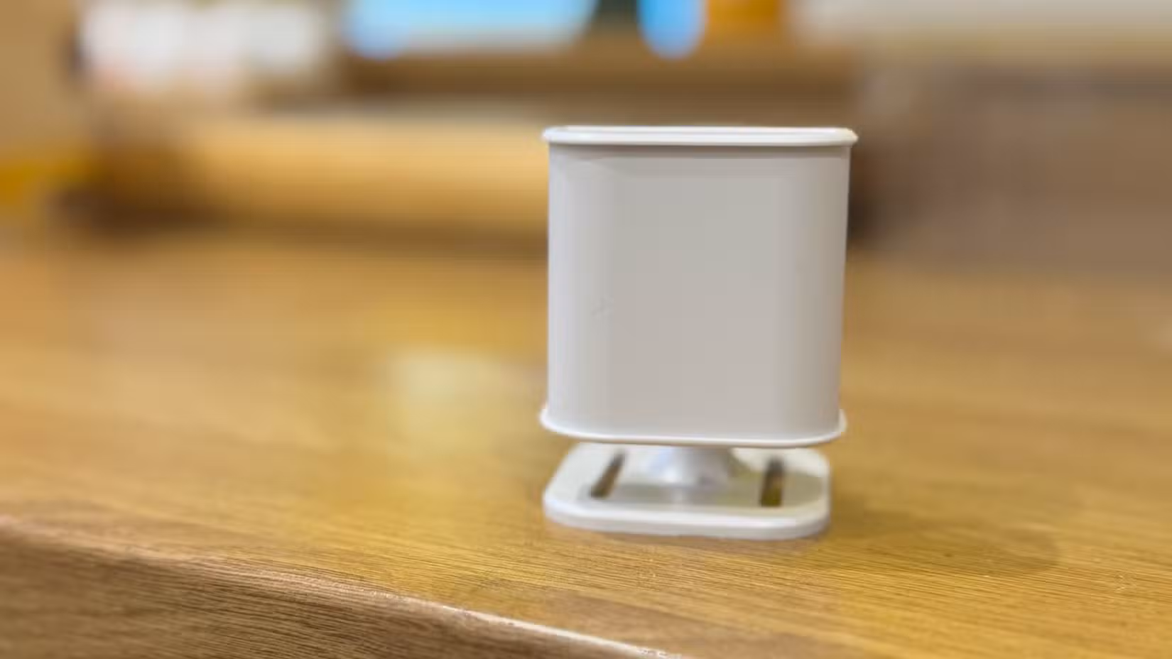 Everything Presence Lite mmWave presence sensor on a work surface.
