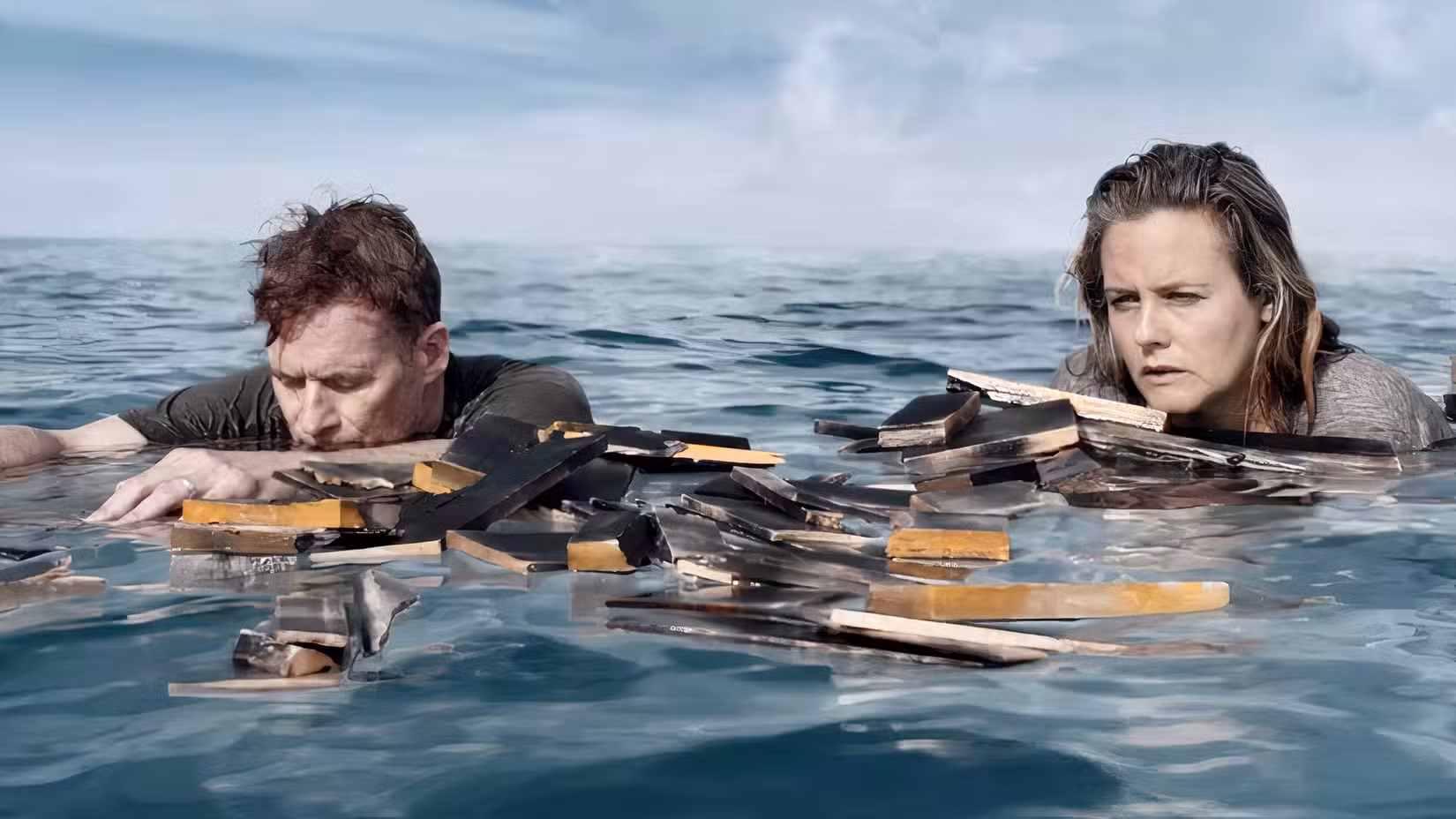 A man and woman drift at sea in The Requin.