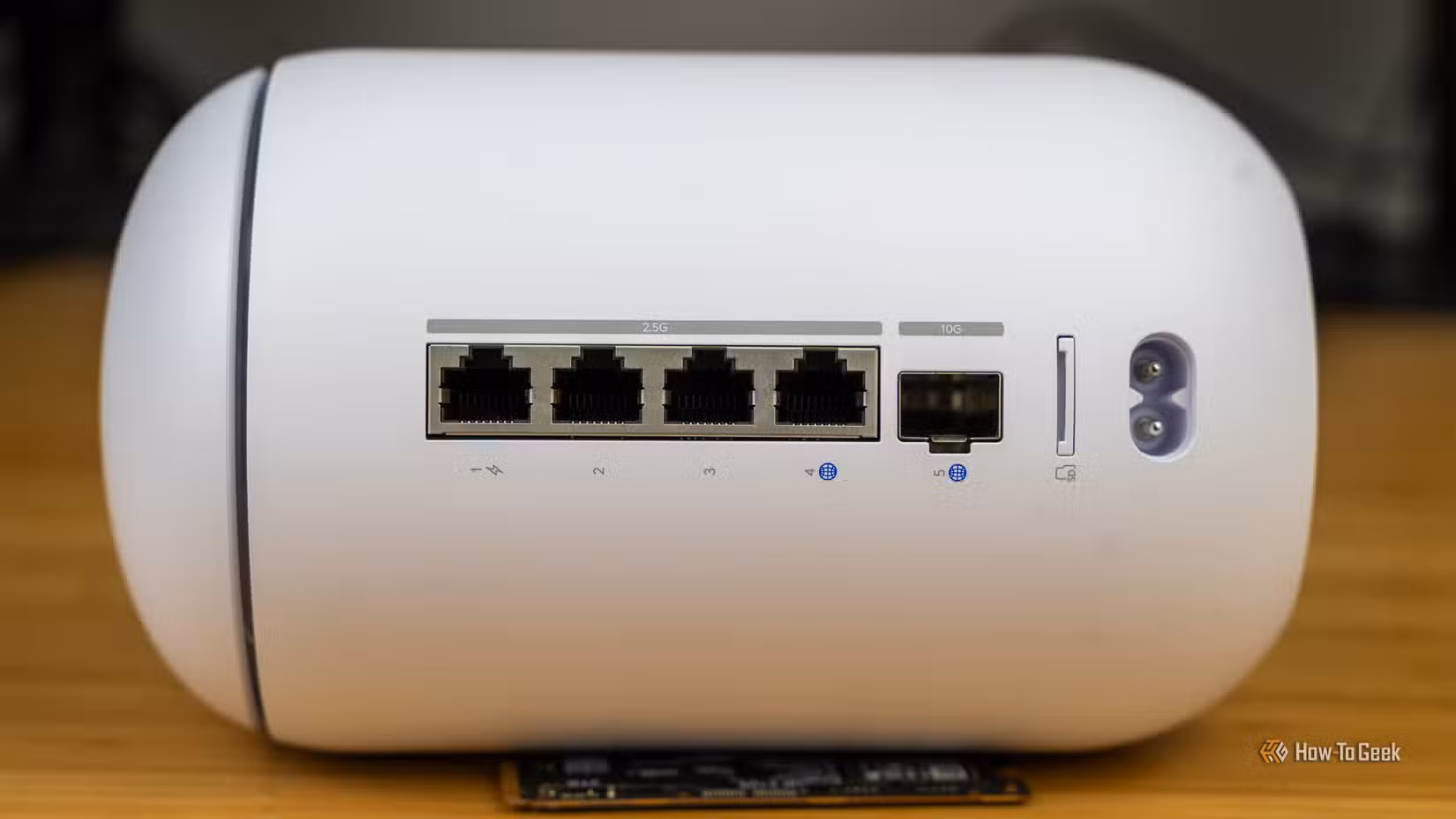 The back Ethernet and SFP+ ports of the Unifi Dream Router 7.