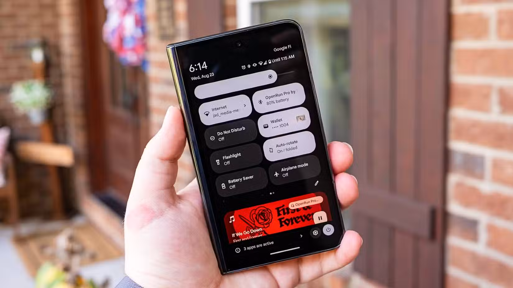 Notification shade and quick settings on the Google Pixel Fold with the phone folded close.