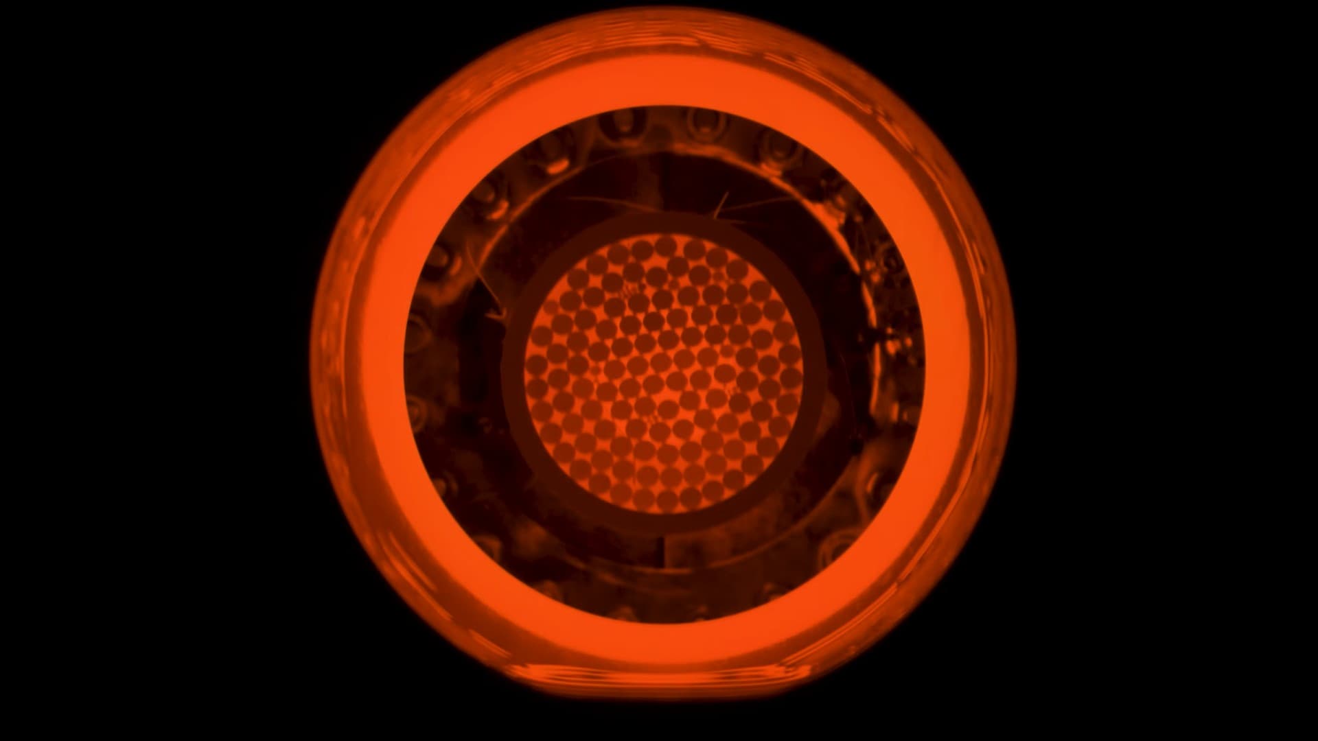 a series of bright red concentric rings on a black background