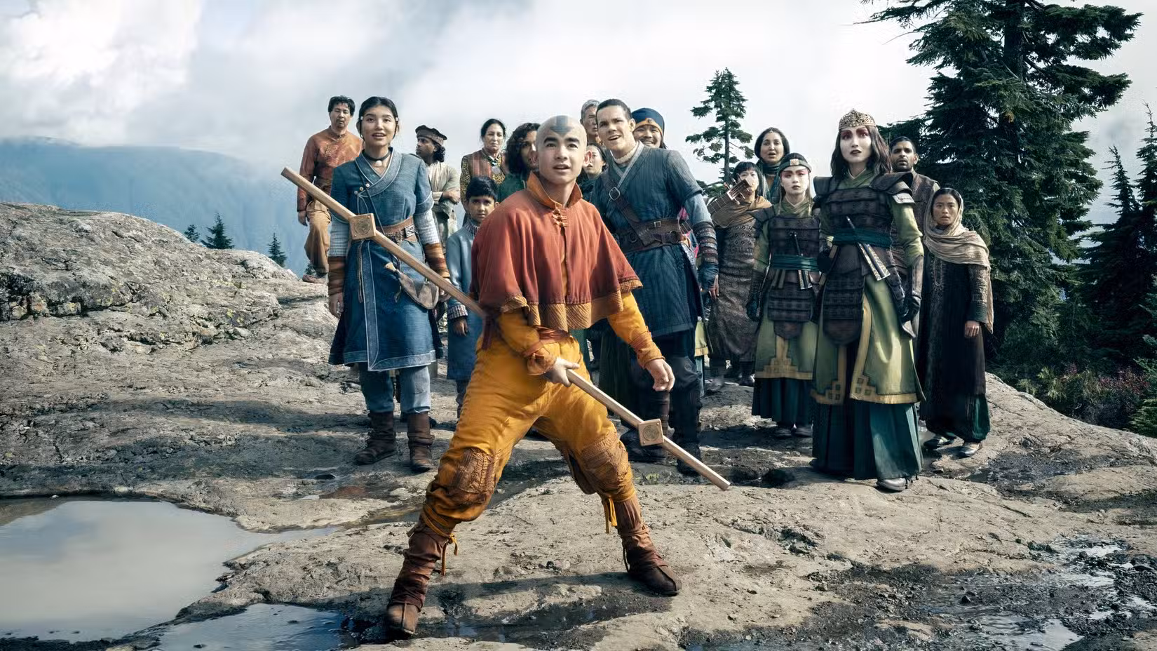 Aang stands with a stick in Avatar The Last Airbender.