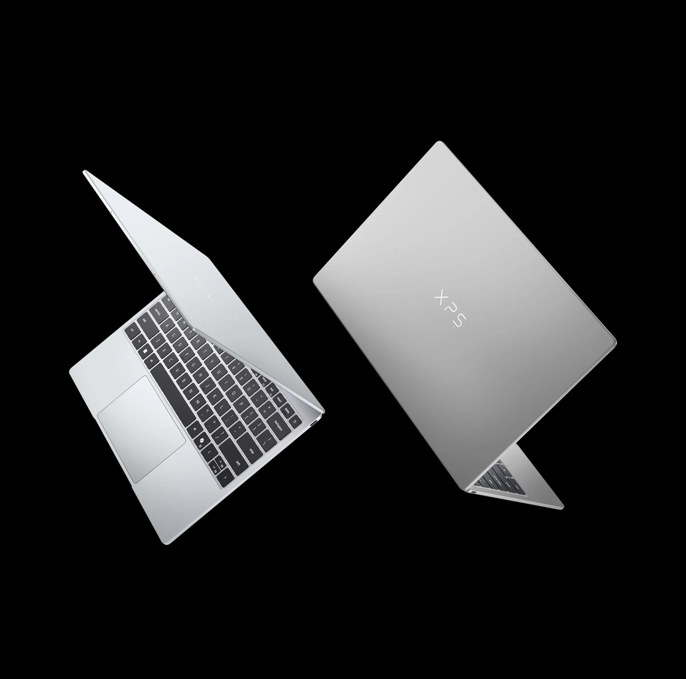 <em>The new XPS 13 in its silver and gray colors, which Dell calls “sky” and “storm.”</em>