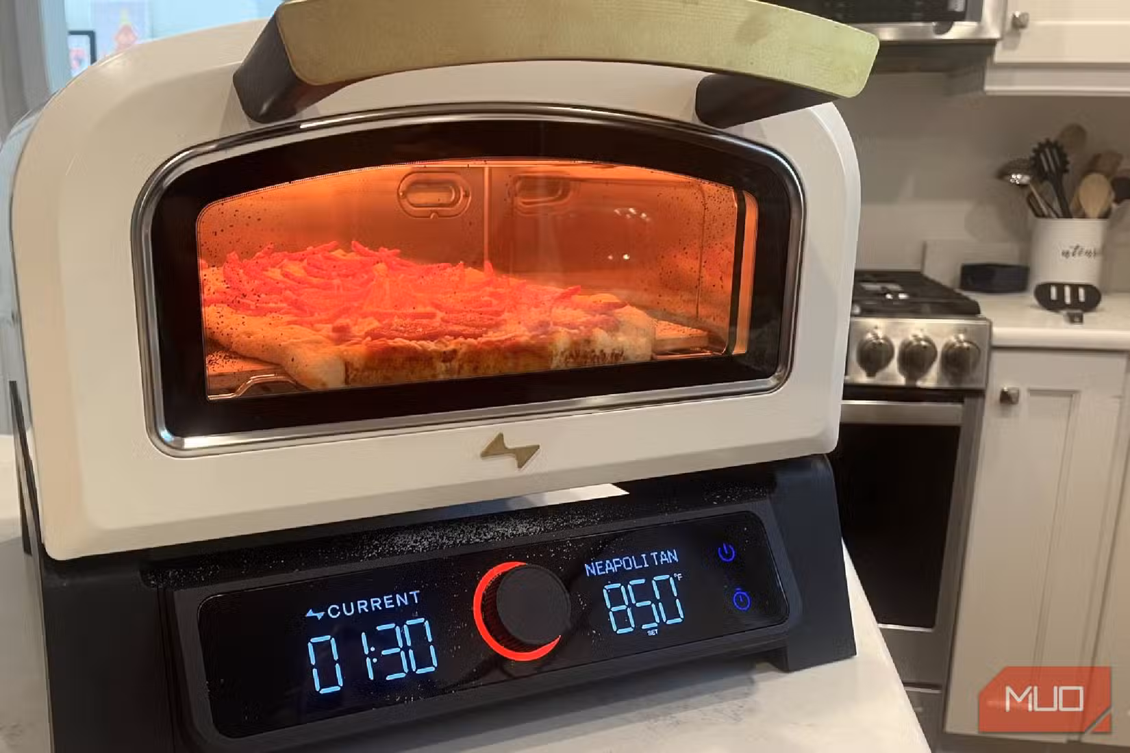 The Current Model P Smart Pizza Oven with a pizza in it