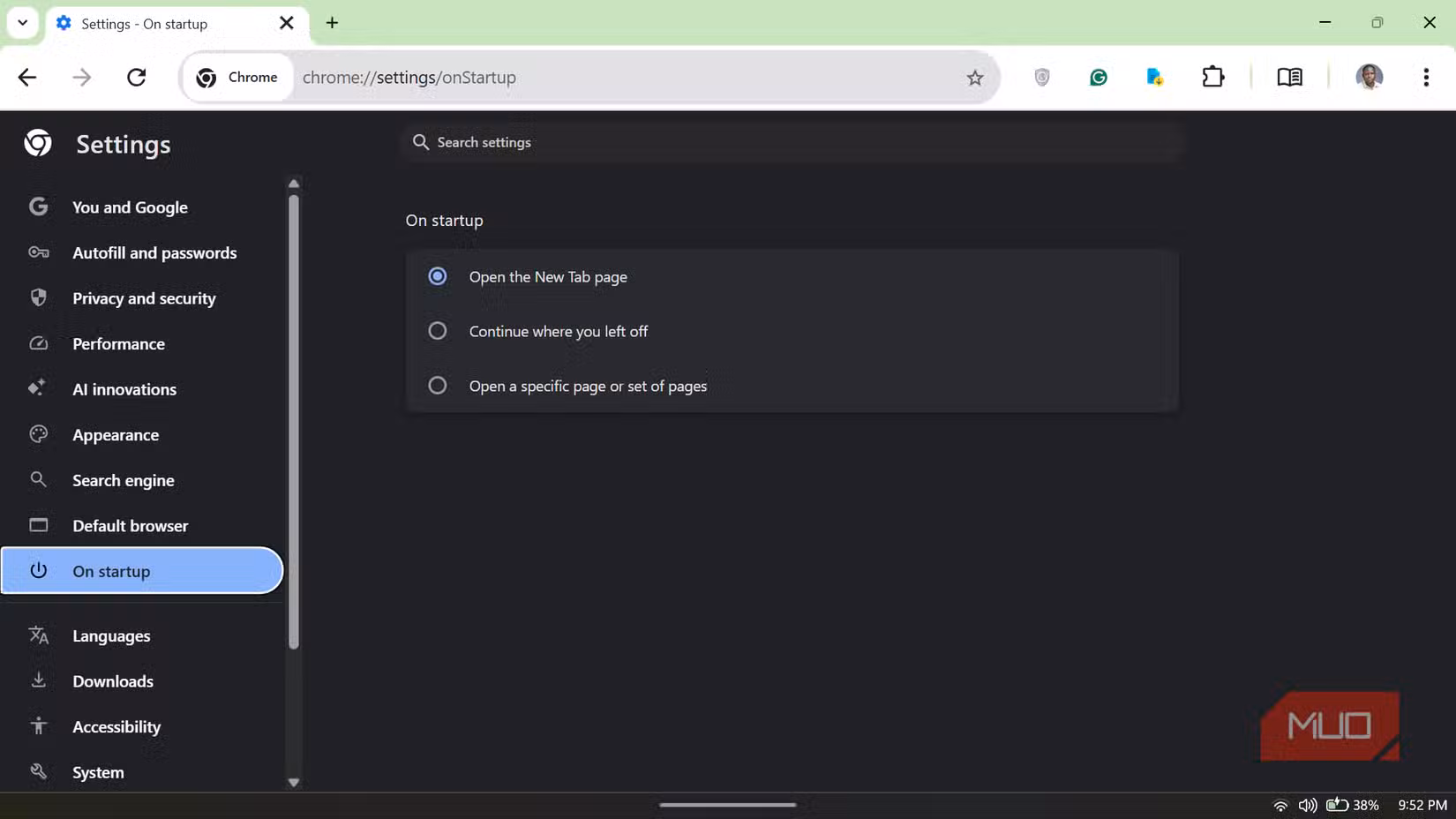 Chrome browser Settings page open to the On startup section in dark mode.