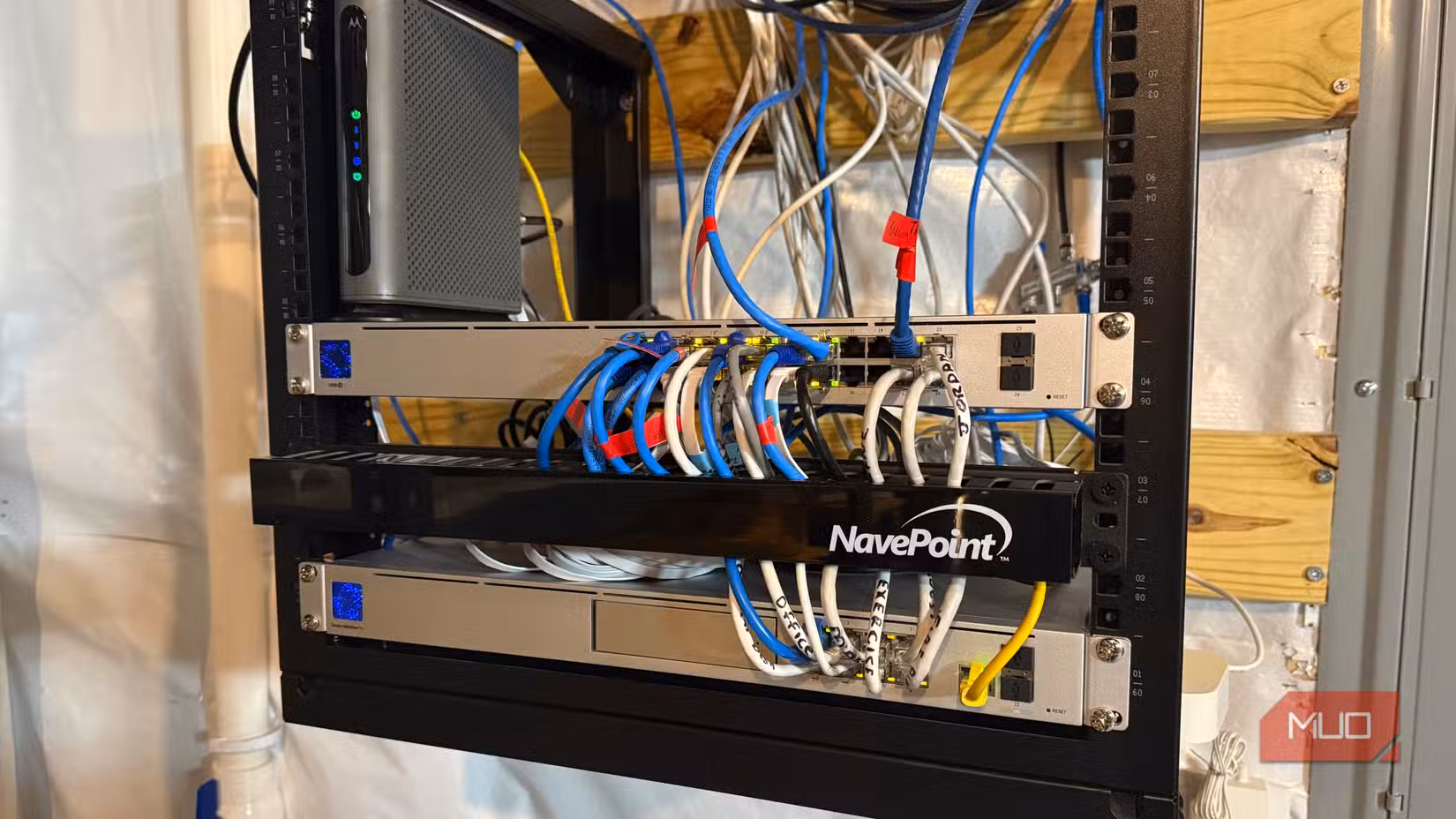 ubiquiti router and network switch on rack