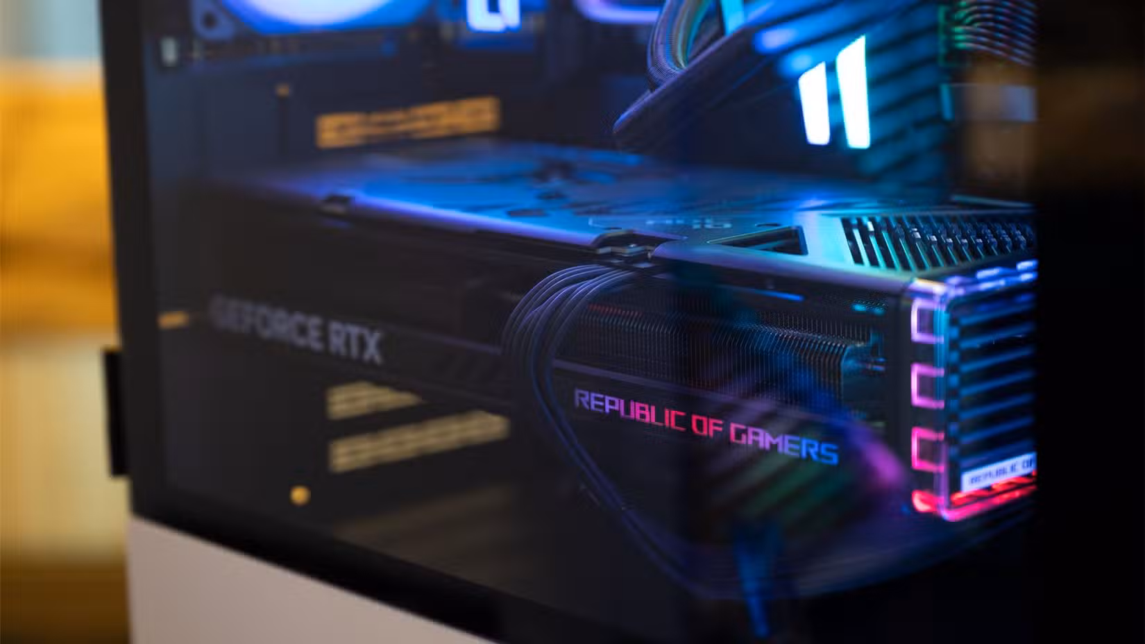ASUS Republic of Gamers NVIDIA GeForce RTX GPU inside a gaming PC.