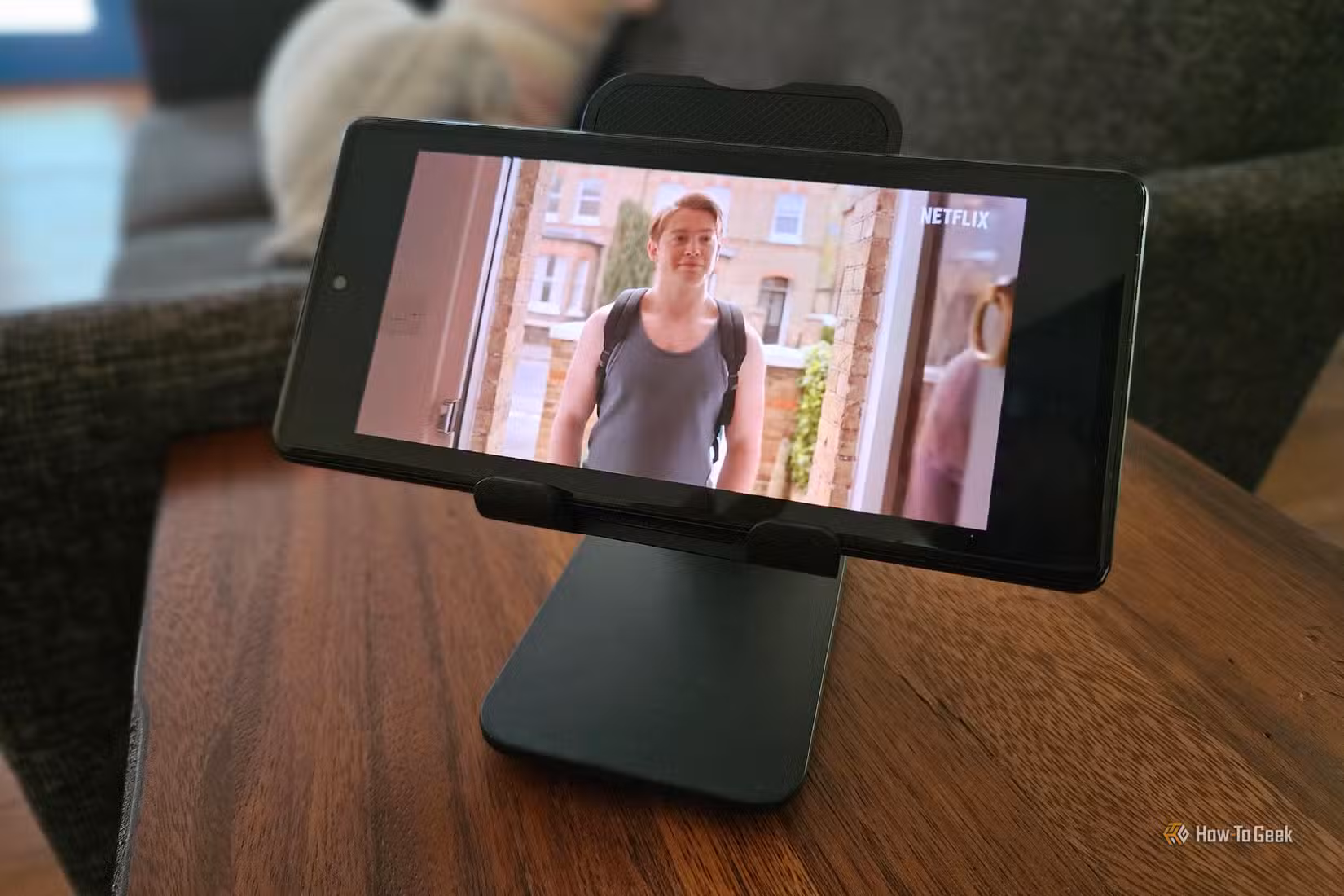 Phone on a stand playing a Netflix video