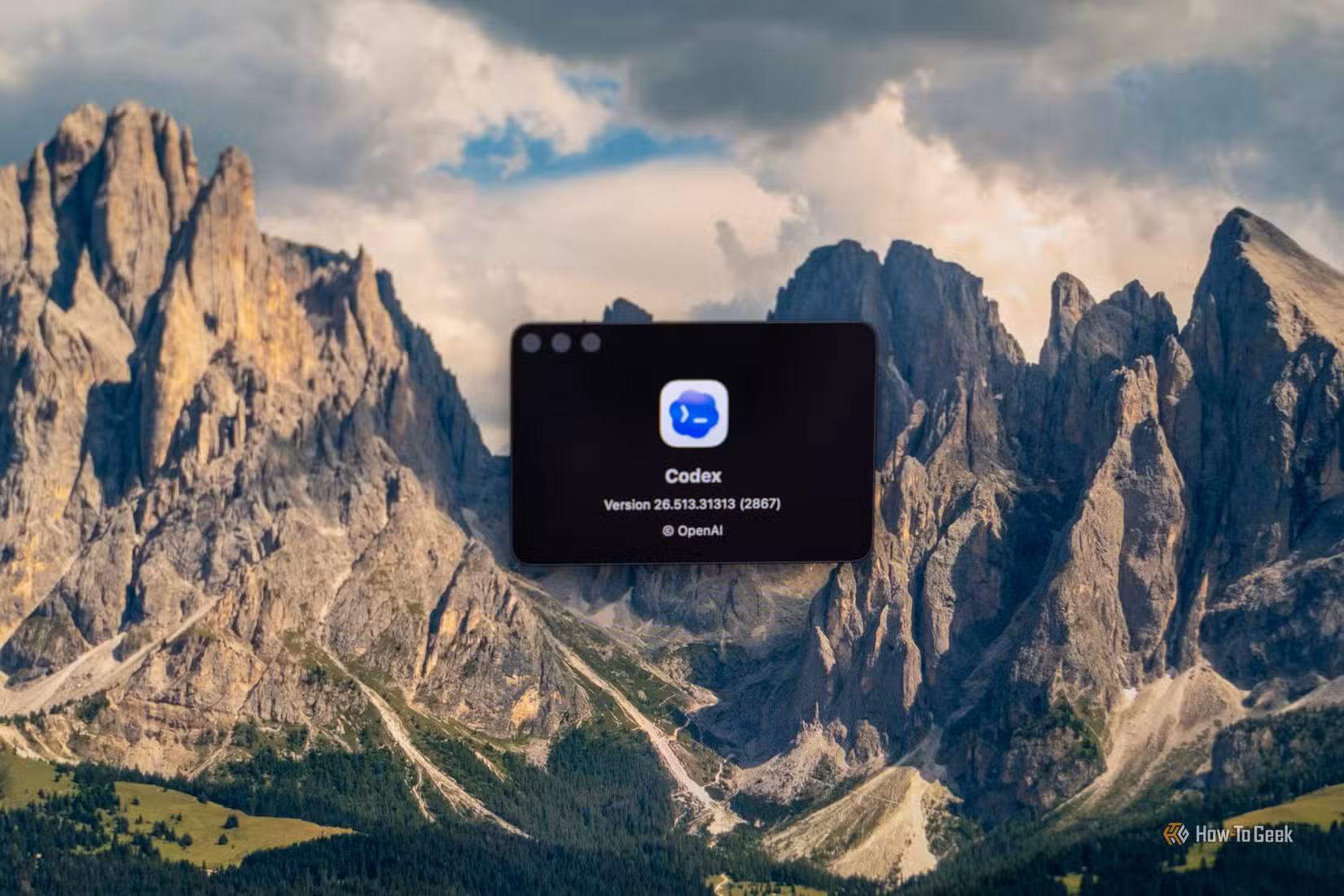 OpenAI Codex about window showing version 26.513.31313 on a mountain desktop.