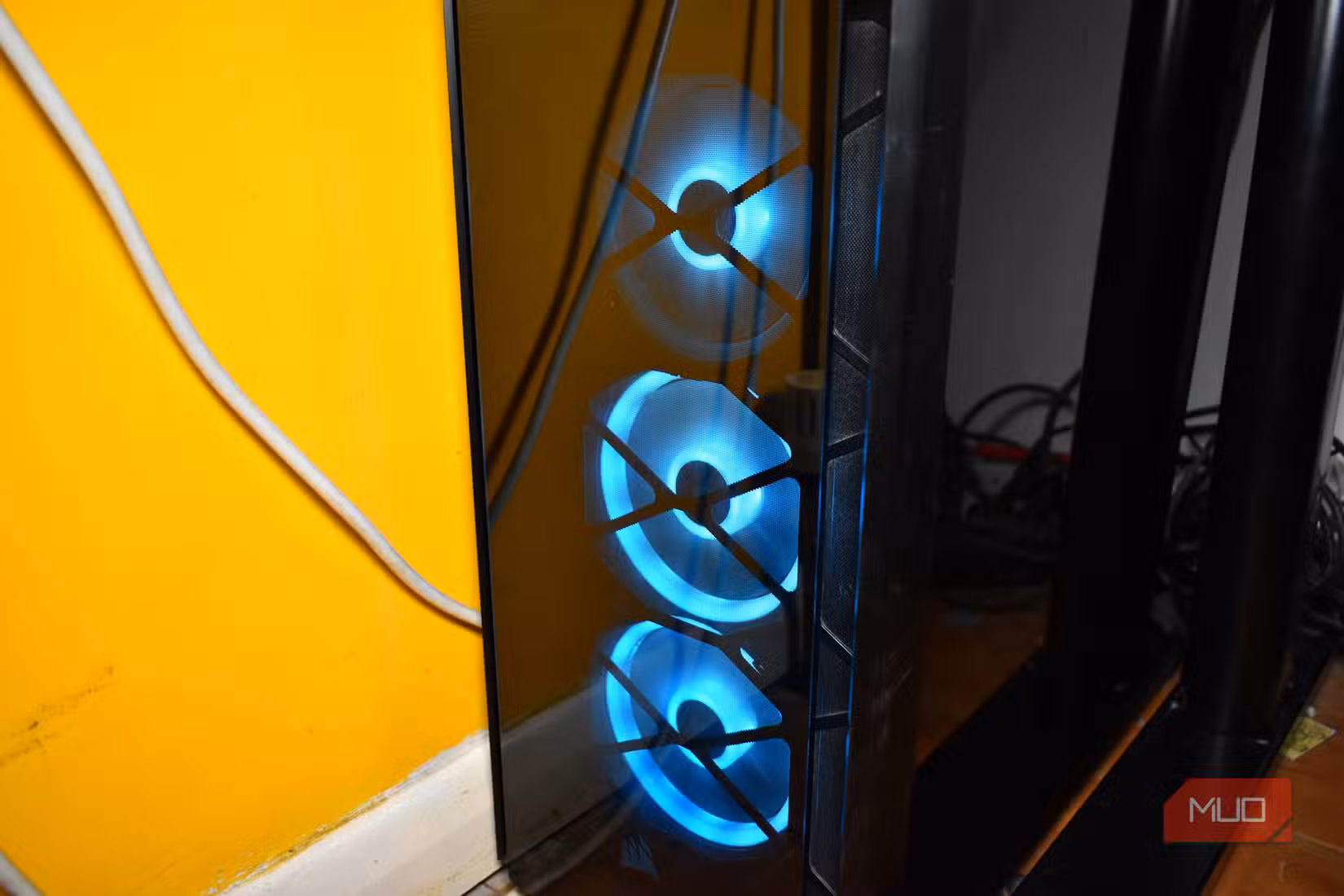 PC stored in the corner.