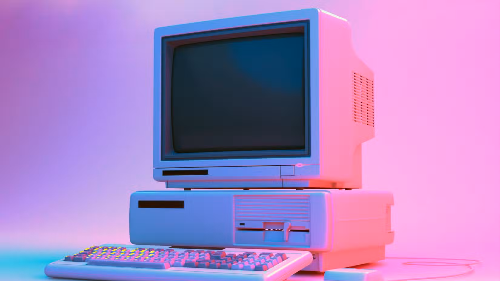 Vintage Desktop PC with Floppy Drive, Keyboard and Mouse in Neon Lighting.