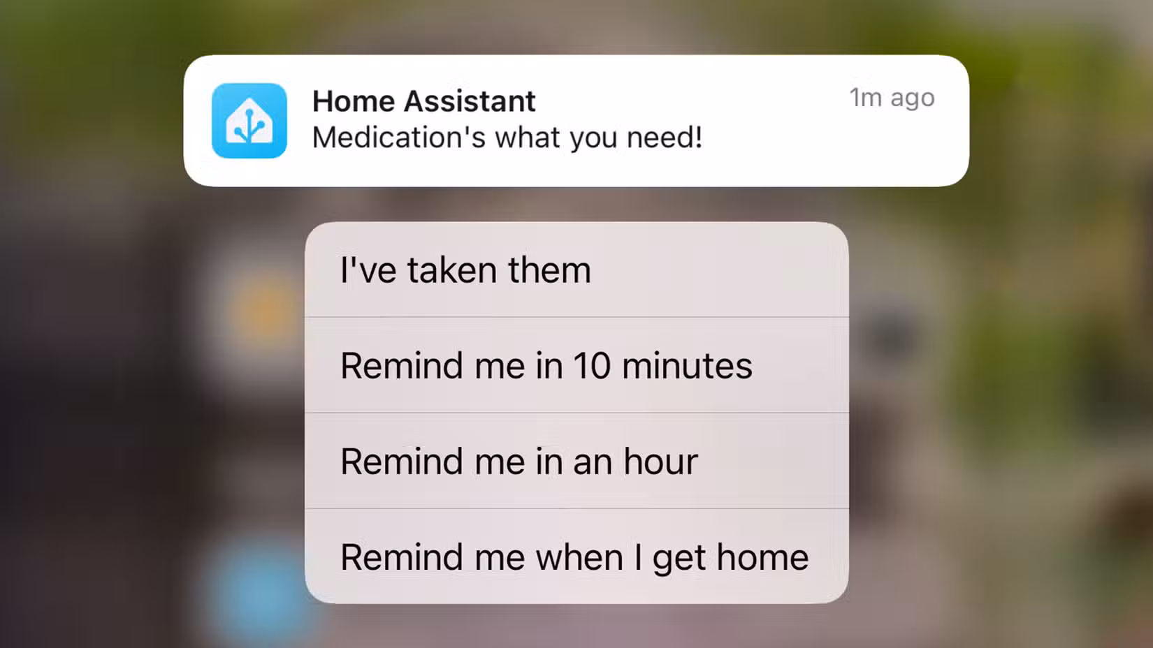 An actionable notification from Home Assistant on an iPhone with four available actions to select.