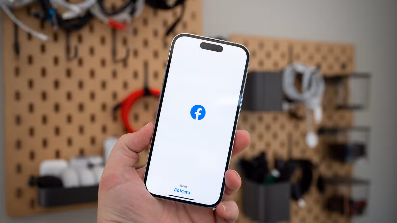 Facebook from Meta loading screen on an Apple iPhone 14 Pro.