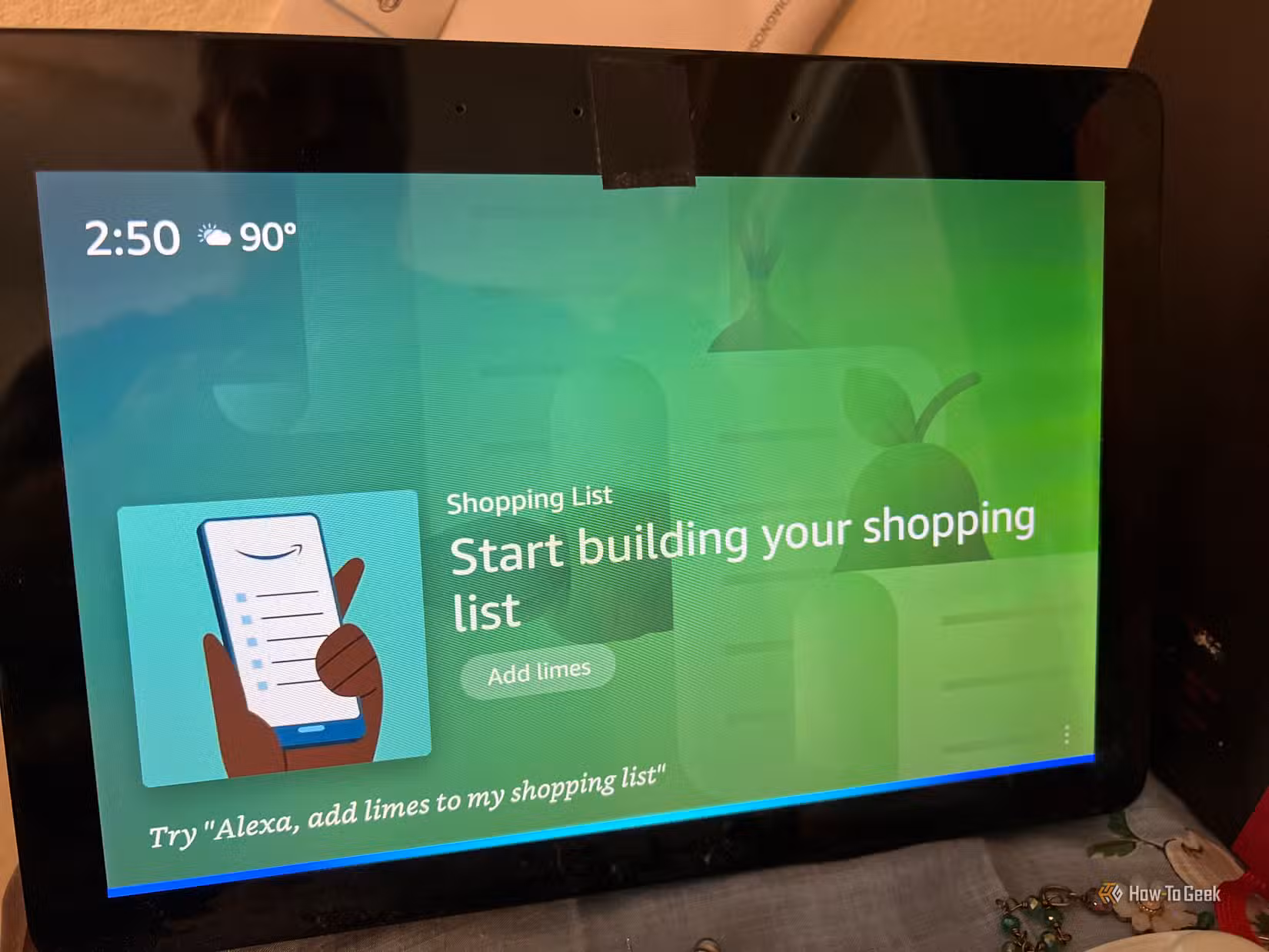 An image of an Alexa device on a desk.