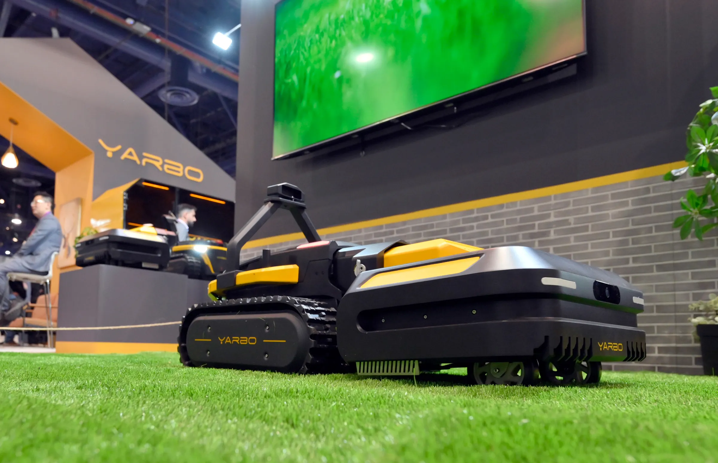 Image may contain Grass Lawn Plant Device Lawn Mower Tool Person and Mowing Lawn