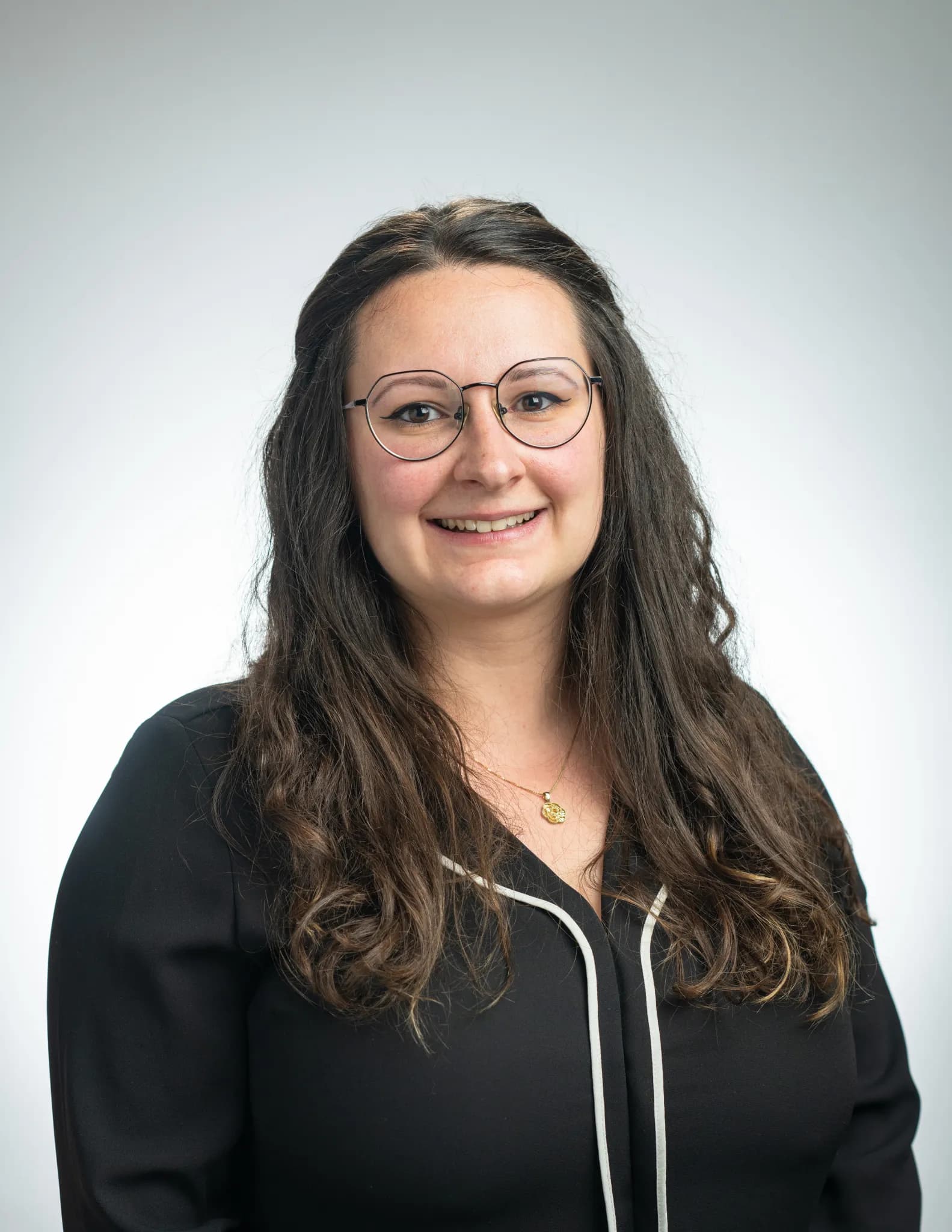 Studio portrait of Lora Jovanovic, a scientist at NASA Ames Research Center.