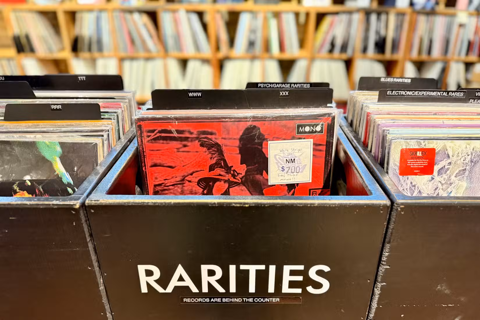 A vinyl record bin marked Rarities