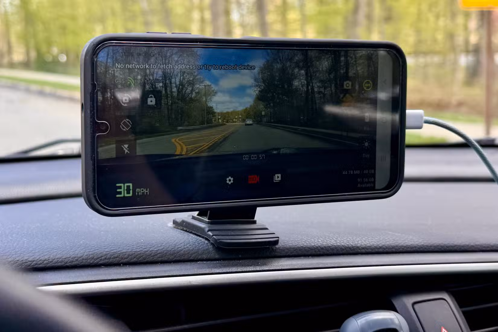 Speed on dash cam app on a Samsung device in a car.