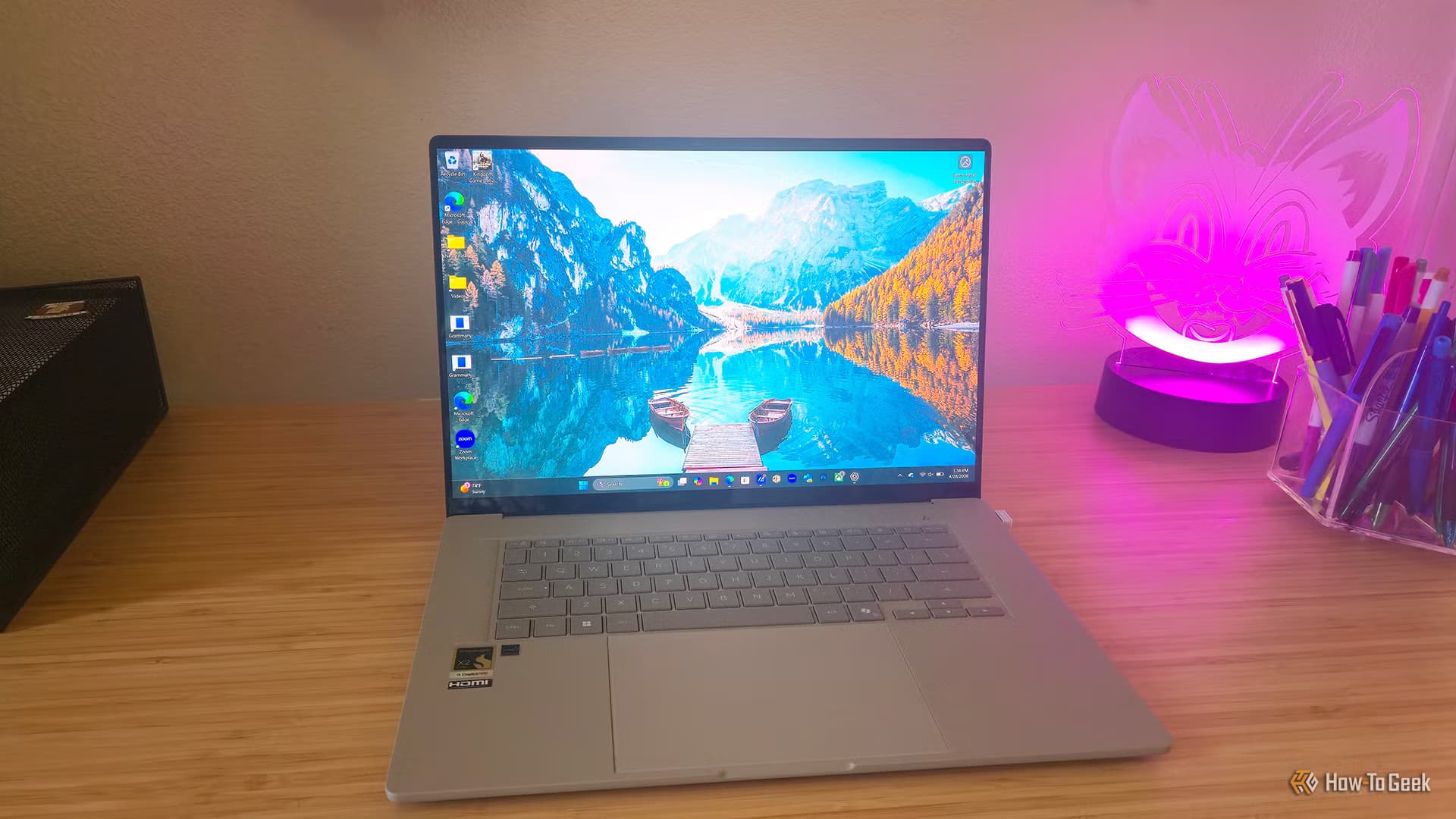 The ASUS Zenbook A16 (2026) laptop sitting open on a desk.