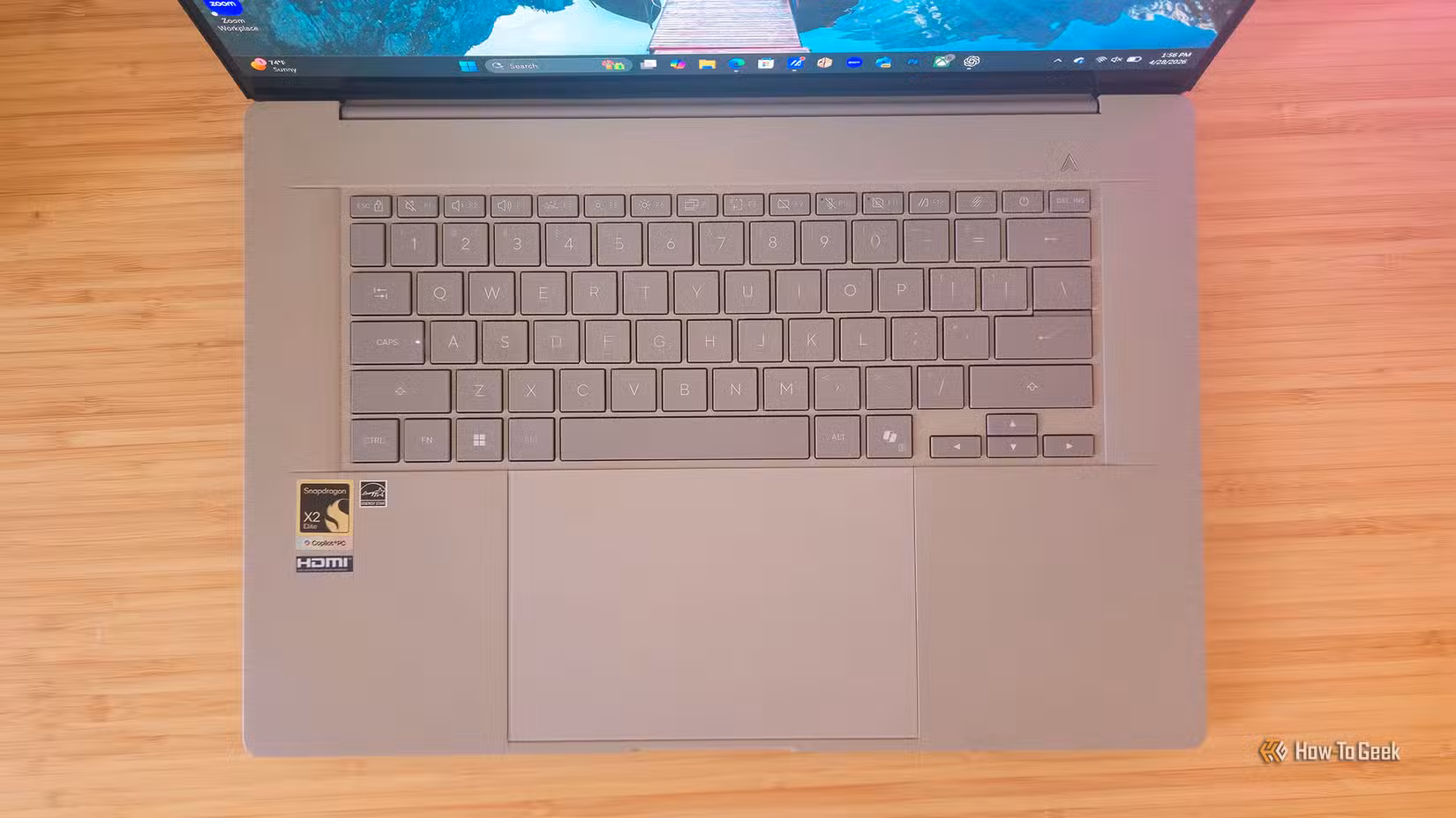 The keyboard and the trackpad on the ASUS Zenbook A16 (2026) laptop.