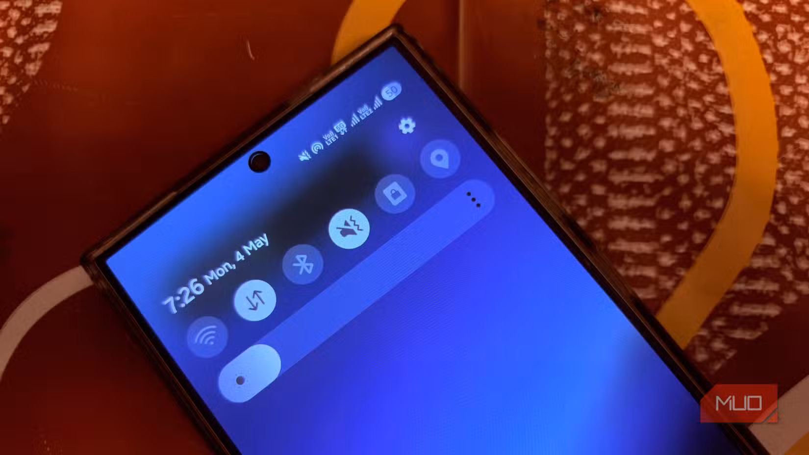 A Samsung Galaxy phone's quick settings notification panel pulled down partially