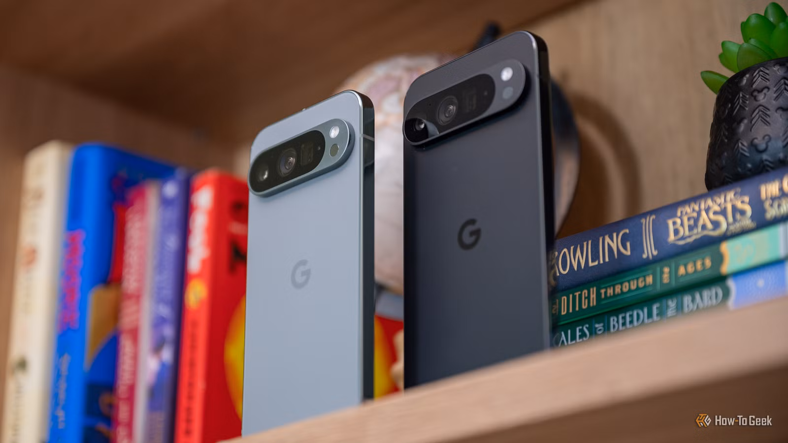 Google Pixel 9 Pro and 9 Pro XL cameras standing on a shelf-1