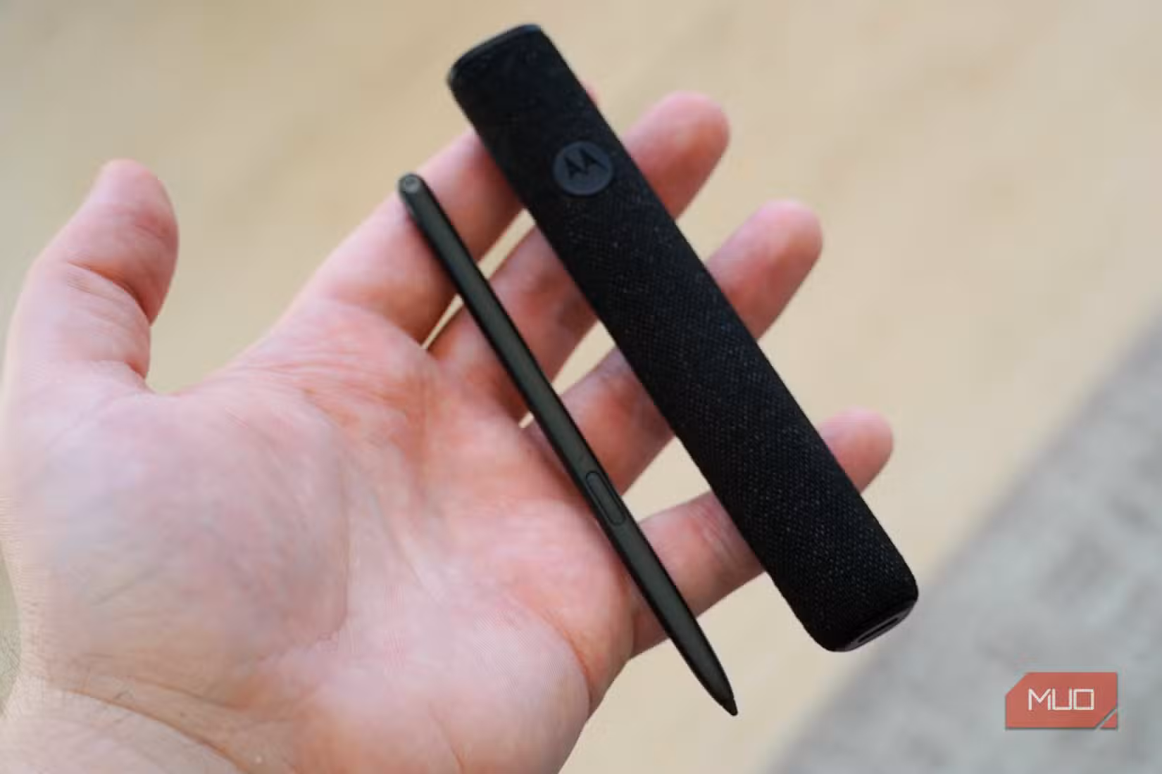 The Motorola Moto Pen Ultra beside its case.
