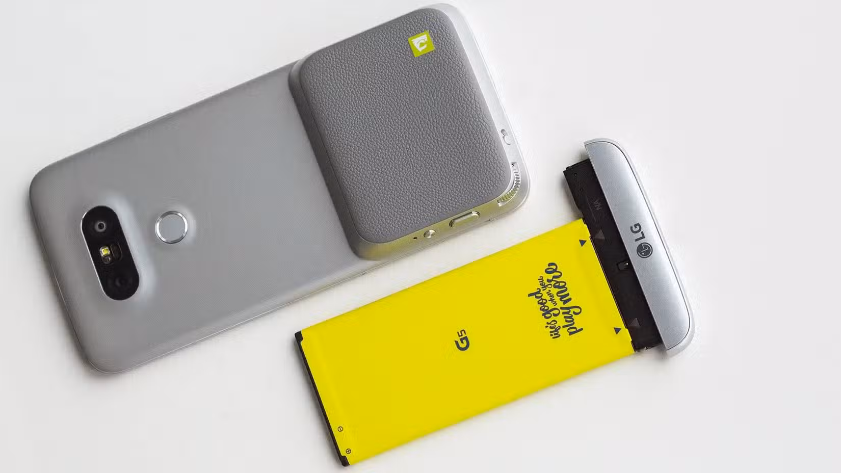 LG G5 with a camera module attached to it and another module lying next to it
