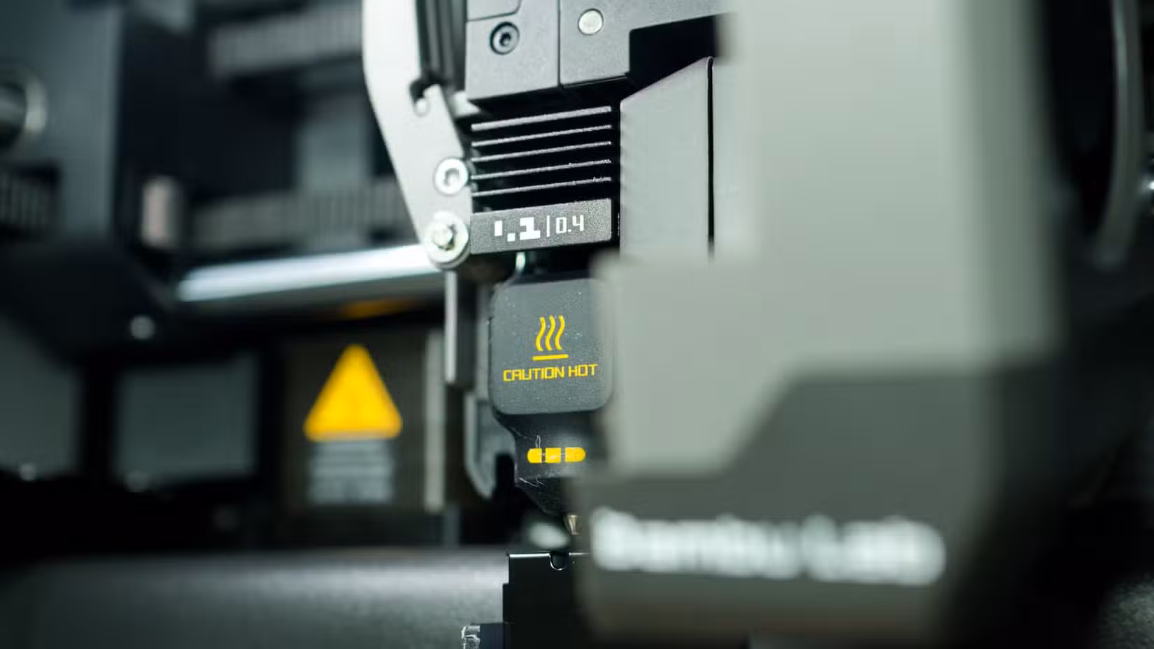 Bambu Lab P2S print head with 0.4mm nozzle on display.-1
