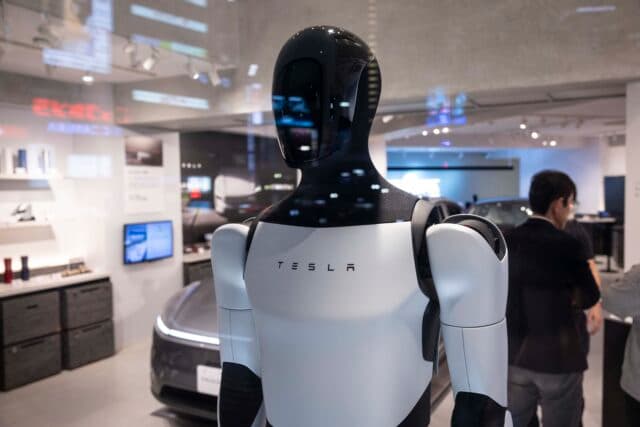 JAPAN - 2025/04/25: Tesla Optimus humanoid robot on display inside the Tesla pop-up store near Shibuya crossing. In April 2025, Tesla opened a pop-up store in Shibuya, Tokyo,