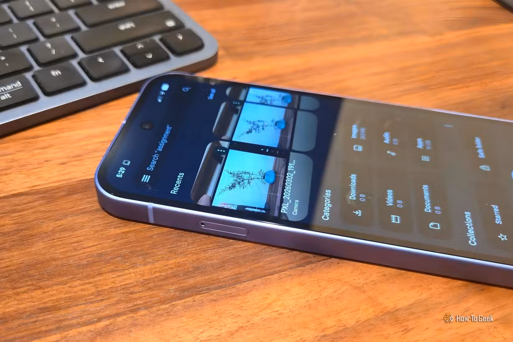 Files By Google file manager on a Google Pixel 10a next to a keyboard.