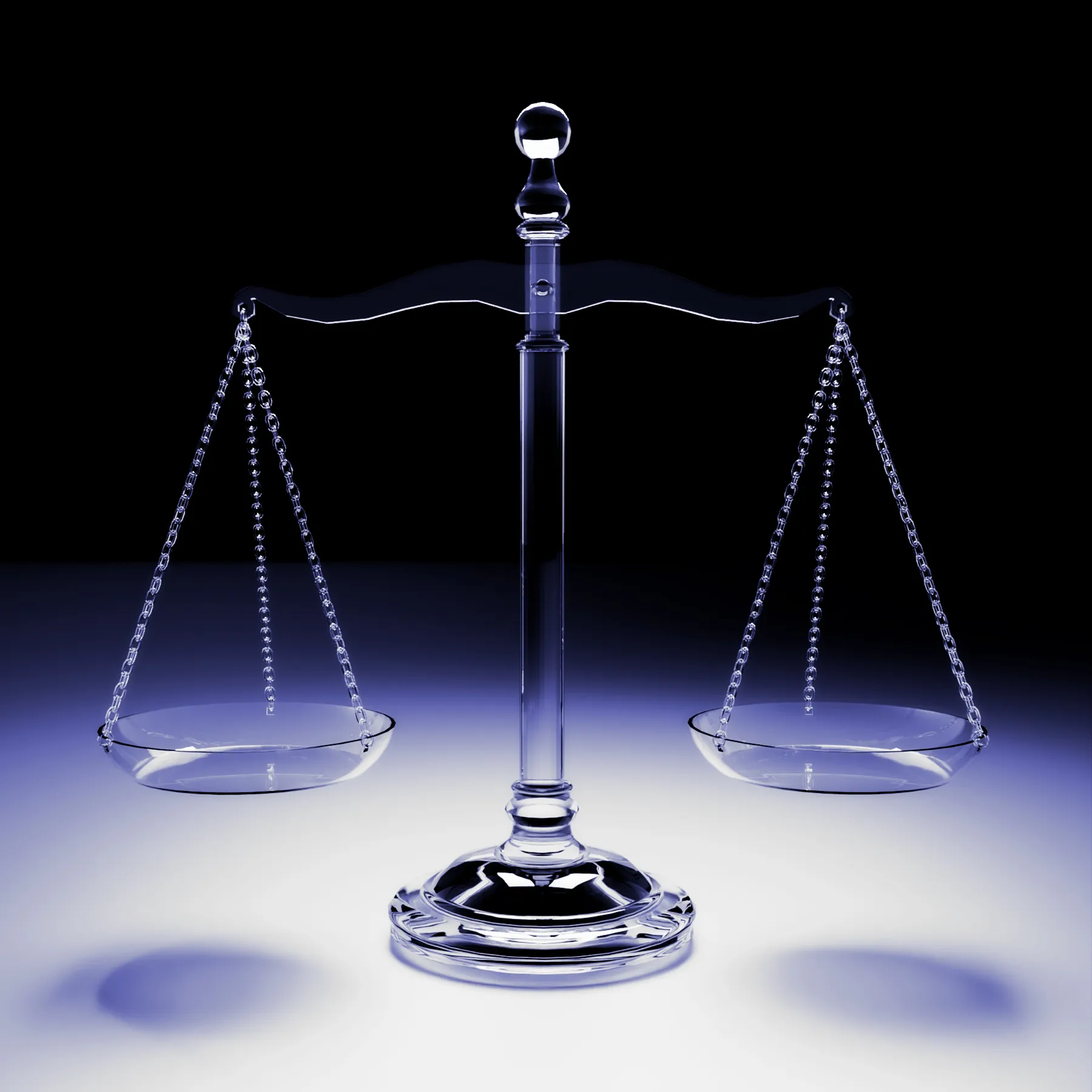 An image of glass scales above a white surface.