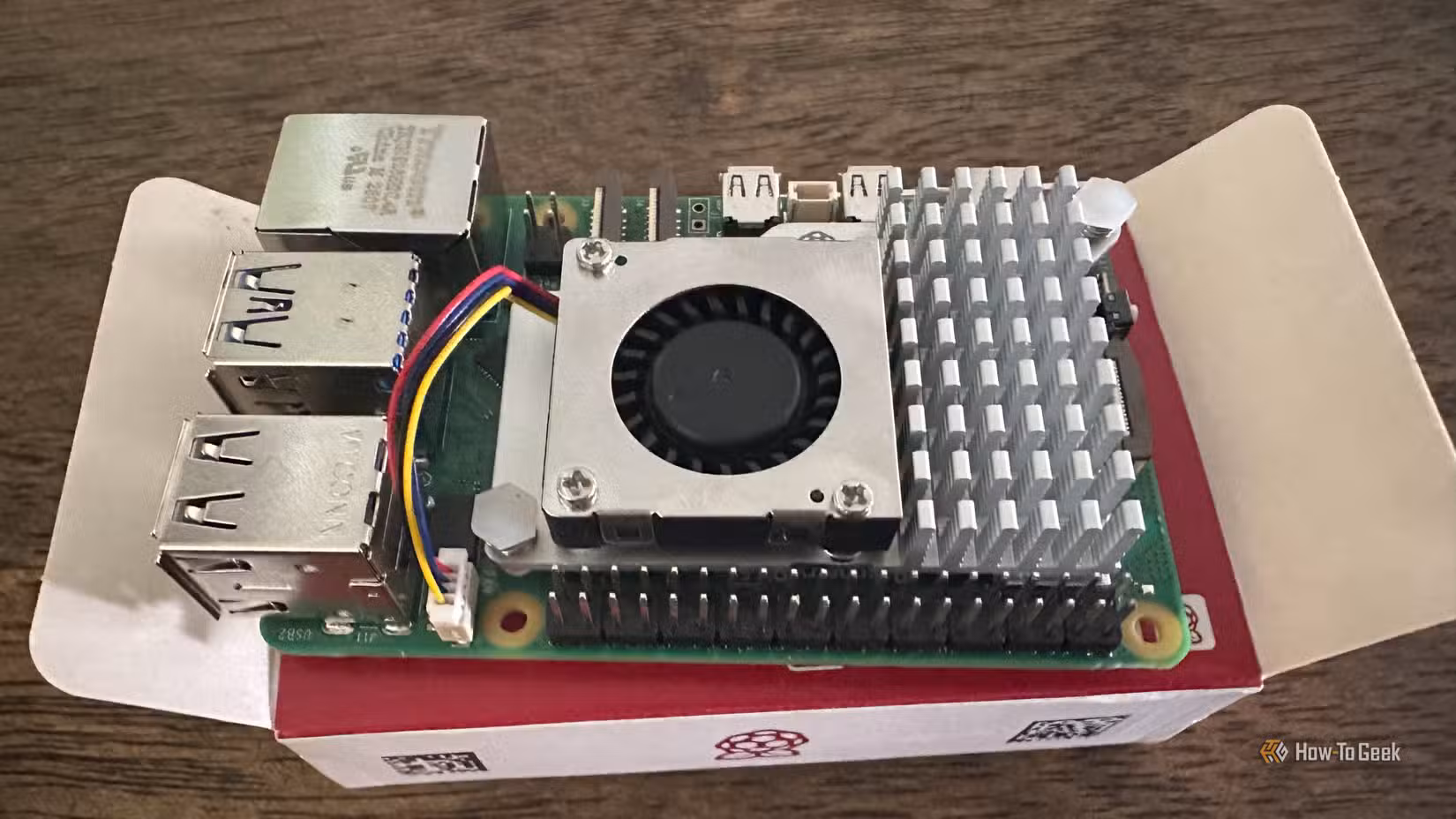 A Raspberry Pi with its offiical cooler fitted.